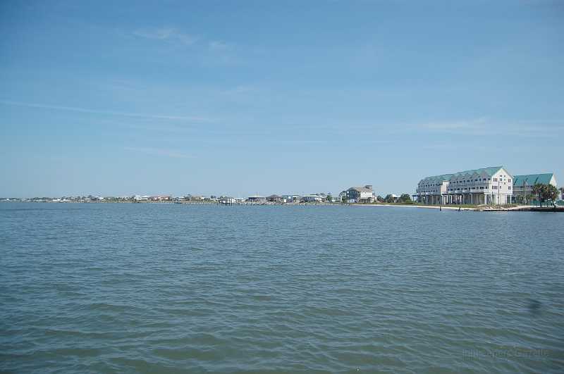 Bridge  - Spring 2006 021.JPG - Alligator Point is a thriving community ... a great place for a family get-away.  The condominiums in the right of the picture are a recent addition.  Properties damaged by Katrina are being repaired, and empty lots appear to be filling with new properties.